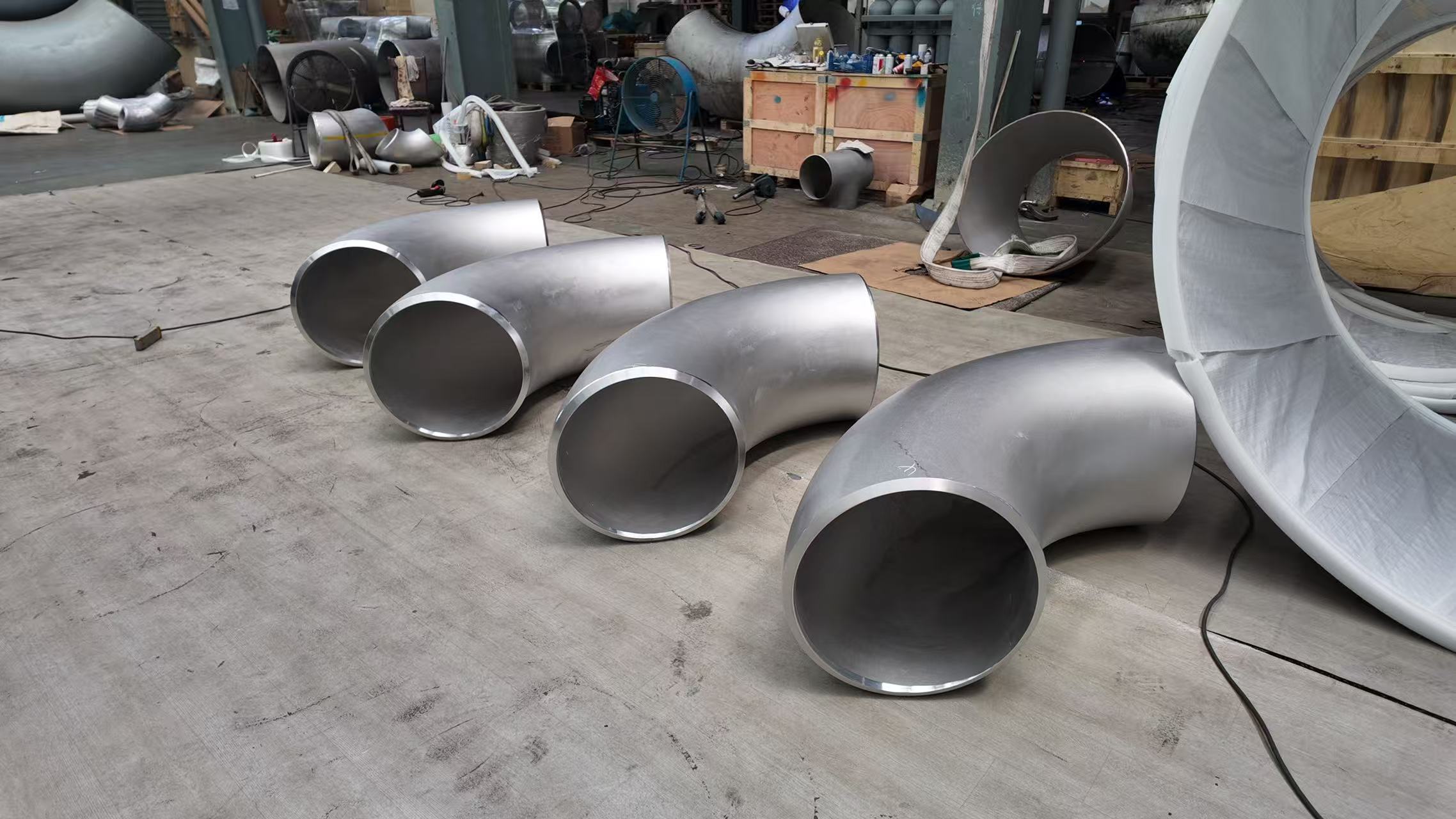 Why Do Engineers Specify Forged Fittings Over Cast Alternatives for Critical Piping Systems?